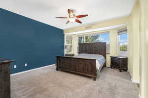 Bedroom with carpet floors and ceiling fan