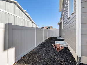 View of fenced backyard