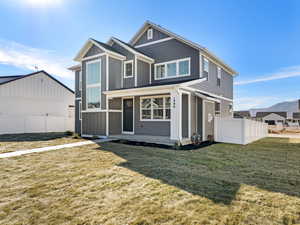 View of front of house featuring board and batten siding