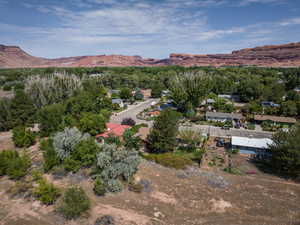 Aerial view of property's location featuring mountains
