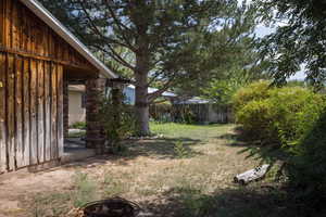 View of yard featuring an outdoor fire pit