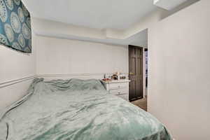 Bedroom featuring carpet flooring
