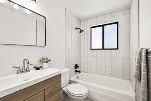 Full bath with shower / tub combination and vanity