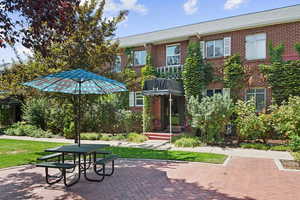 View of home's community featuring a lawn