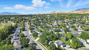 Aerial perspective of suburban area with mountains