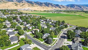 Aerial view of residential area with a mountainous background