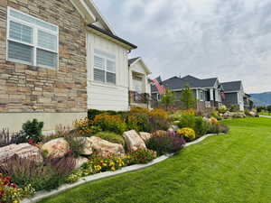 View of green lawn with a mountain view