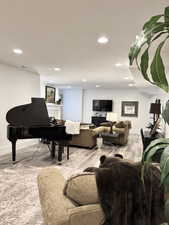 Living area featuring recessed lighting and wood finished floors