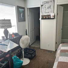 View of carpeted bedroom