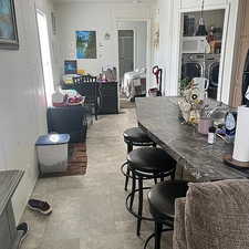Dining area featuring washer and clothes dryer