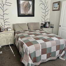 Bedroom featuring dark carpet