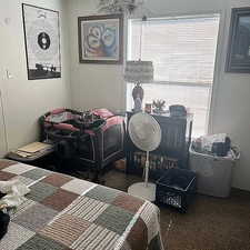 View of carpeted bedroom