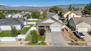 Aerial view of residential area with a mountainous background