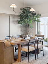 Builders Model for example purposes only. Dining space featuring light wood finished floors