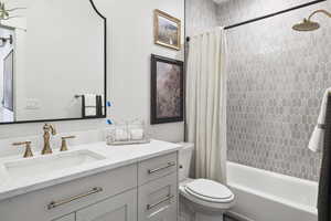 Builders Model for example purposes only. Bathroom featuring vanity and shower / tub combo