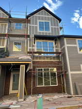View of home's exterior featuring brick siding