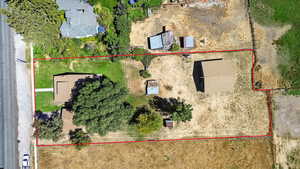 Aerial overview of property's location featuring property parcel outlined