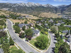 Aerial view of residential area featuring mountains