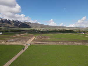 View of mountain backdrop featuring rural landscape