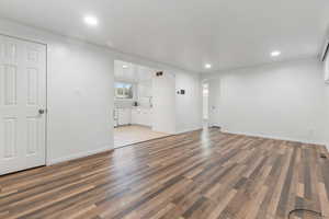 Unfurnished living room with recessed lighting and light wood-style flooring