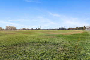 View of grassy yard featuring a view of countryside