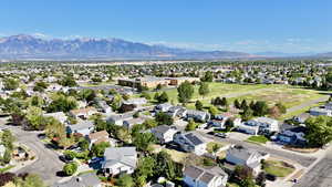 Aerial view of residential area featuring mountains