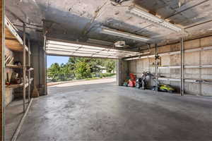 Garage featuring a garage door opener