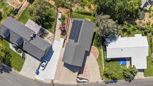 Aerial view of property and solar panels