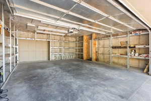 Garage featuring a garage door opener