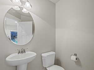 Bathroom with toilet and a sink