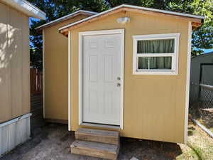 View of shed featuring entry steps