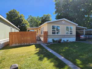 Manufactured / mobile home with an attached carport