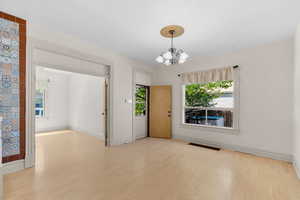 Living/Dining  looking towards front door & bedroom