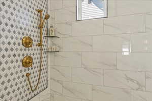 Bathroom view of a tile shower