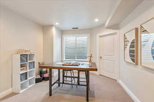 Home office featuring light colored carpet and recessed lighting