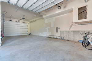 Garage featuring electric panel