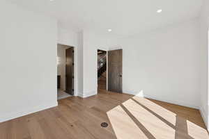 Unfurnished room featuring recessed lighting and light wood-type flooring