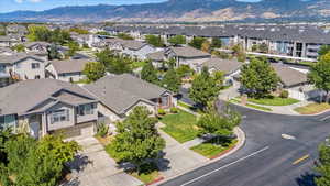 Aerial view of residential area featuring a mountain backdrop