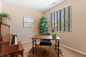 Office featuring light colored carpet