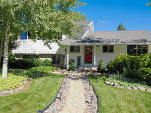 View of front of home with front yard