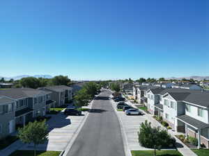 View of asphalt street featuring a mountain view