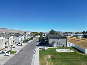 Aerial perspective of suburban area featuring mountains