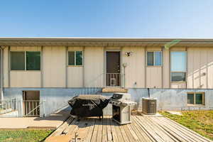 Rear view of house with a deck