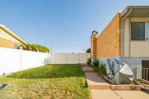 View of fenced backyard