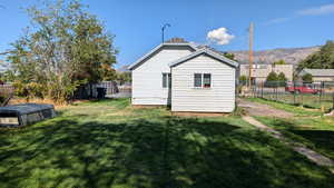 View of outbuilding with a mountain view