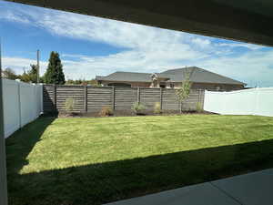 View of fenced backyard