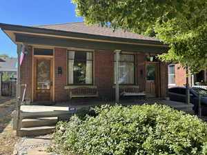 Side by Side duplex  with front porches & front porch swings