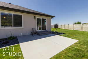 View of patio featuring a storage shed