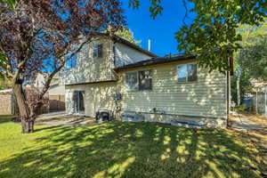 Rear view of house featuring a patio area