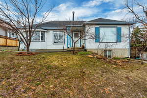 Single story home with roof with shingles.